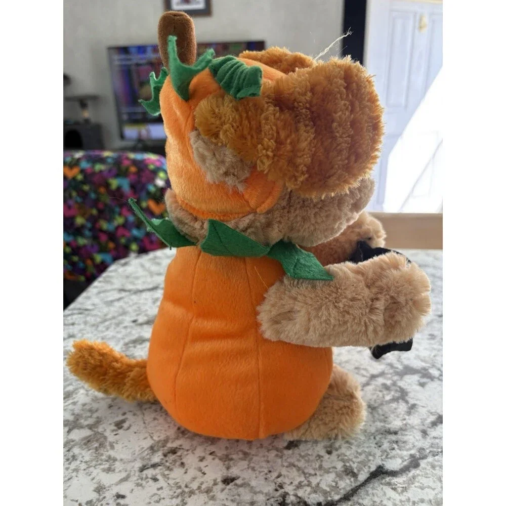 Avon Halloween Singing Dog w/ Trick or Treat Bag Pumpkin Outfit We Got the Treat